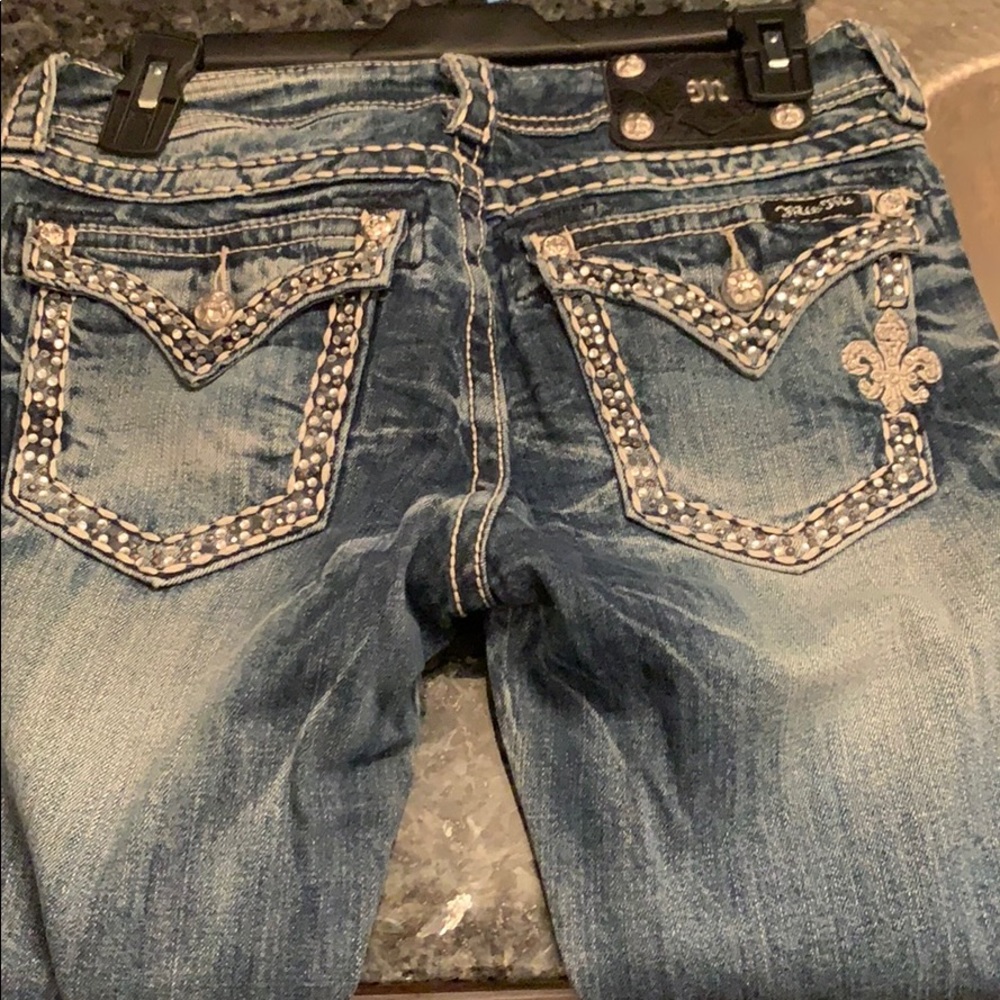 Boot cut miss me faded jeans